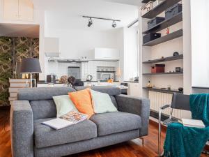 The Best Rent - Cozy loft in De Angeli district的休息区