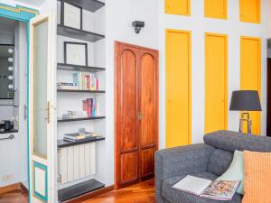 The Best Rent - Cozy loft in De Angeli district的休息区
