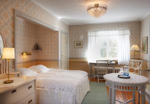 锡格蒂纳斯蒂弗特尔森酒店与会议中心客房内的一张或多张床位