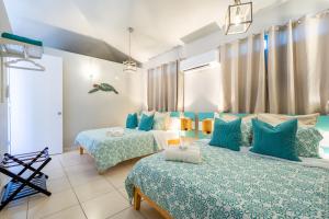 Villas at Aguada Sea Beach客房内的一张或多张床位
