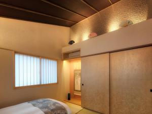 Kanade Kamogawa-Seseragian客房内的一张或多张床位