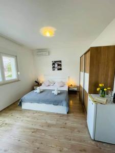 Apartman & rooms Draga客房内的一张或多张床位