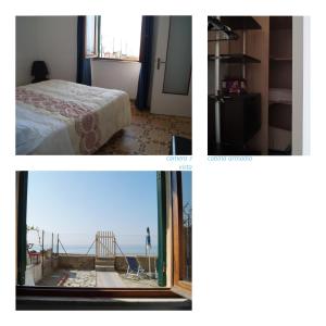 瓦拉泽CASAVACANZE GIEFFE的客房设有一张床和一个享有海景的窗户。