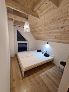 Na Hamaku Jacuzzi & Sauna客房内的一张或多张床位