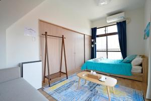Oji Natural Cosy House客房内的一张或多张床位
