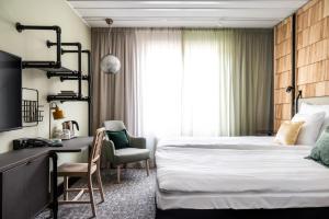 原始艾瑞娜斯科酒店客房内的一张或多张床位