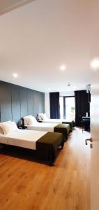 Residencial Douro客房内的一张或多张床位