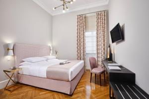 MiraMe Athens Boutique Hotel-House of Gastronomy客房内的一张或多张床位