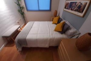 Apartamento moderno Timanfaya客房内的一张或多张床位