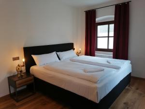 Hotelgasthof Kirchenwirt客房内的一张或多张床位