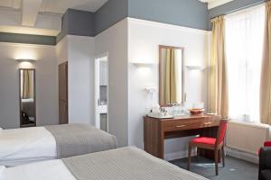 皇家牛津酒店客房内的一张或多张床位