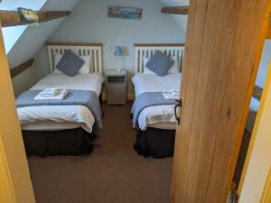 Whitby Sea View Cottage客房内的一张或多张床位