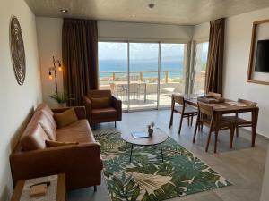 Kallisté Porticcio AppartHotel Golfe d Ajaccio的休息区