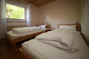Ferienhäuser Campingplatz客房内的一张或多张床位