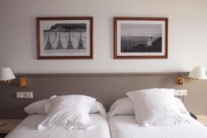 埃塞萨酒店客房内的一张或多张床位