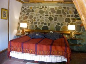 酝酿自然阿蒂特兰酒店客房内的一张或多张床位