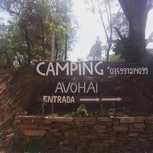 圣托梅-达斯莱特拉斯Camping Avohai的进入canningolan entiatario的标志