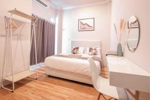 Krisan Guest House Syariah Banjarbaru Mitra RedDoorz客房内的一张或多张床位