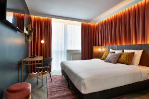 The Scott Hotel Brussels客房内的一张或多张床位