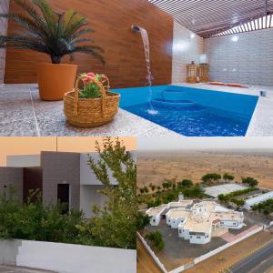Al Wāşil东方之夜酒店的一张照片和一座游泳池和一座房子相拼合