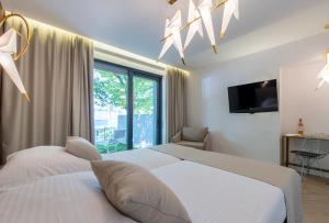 Bošket Luxury Rooms客房内的一张或多张床位