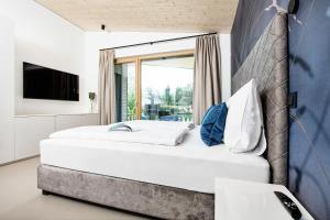 Privates Ferienhaus Velden 24 Home客房内的一张或多张床位