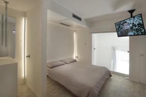 Luxury House Lecce -Le mie 3 Suites-客房内的一张或多张床位