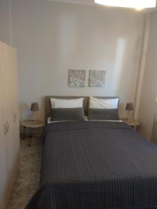 Koala apartments - Rodi, Karidia Ierissos客房内的一张或多张床位