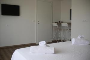 Tourism E Business Superior Rooms客房内的一张或多张床位