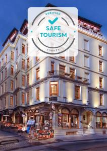 伊斯坦布尔最佳西方帝国皇宫酒店及spa中心的带有阅读大门旅游标志的酒店