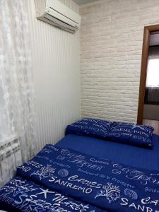 Квартира на Кирова客房内的一张或多张床位