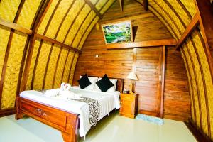 Pondok Bali Cottage客房内的一张或多张床位