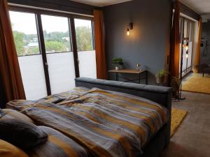 Timeout Lodges - Luxus für Zwei客房内的一张或多张床位