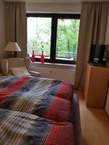 Appartementresidenz am Kurpark Bad Salzuflen客房内的一张或多张床位