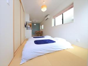 东京古都涩谷2公寓客房内的一张或多张床位