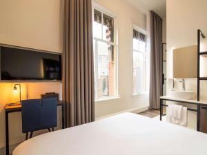 ibis Styles Den Haag City Centre客房内的一张或多张床位