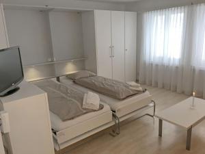 Apartment Val Signina-1 by Interhome客房内的一张或多张床位