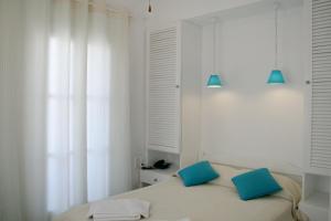 SPIROS & HIROKO Hotel - ADULTS ONLY客房内的一张或多张床位