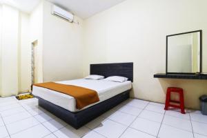 Guest House Taman Sari Syariah客房内的一张或多张床位