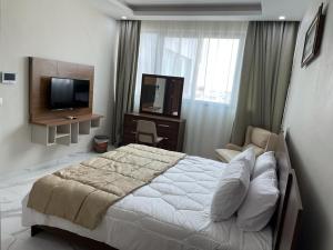 RESIDENCE SYCOMORE 1客房内的一张或多张床位