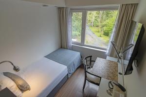 Hotel Landgoed Zonheuvel客房内的一张或多张床位