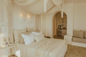 马塞里亚博尔戈里特拉酒店客房内的一张或多张床位