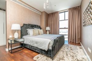Dream Inn Apartments - City Walk Prime客房内的一张或多张床位