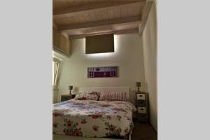 Casetta al Portico, relax e tranquillità客房内的一张或多张床位