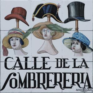 马德里Reina Sofia Boutique II by Madflats Collection的帽子店的标志