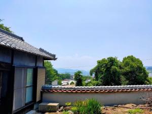 Ichii島旅農園ほとり お手紙と農の宿的美景房屋的屋顶