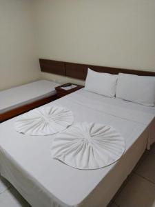 Hotel Sol Bahia客房内的一张或多张床位