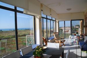 帕洛港2 bedrooms apartement with sea view furnished terrace and wifi at Porto Palo 1 km away from the beach的相册照片