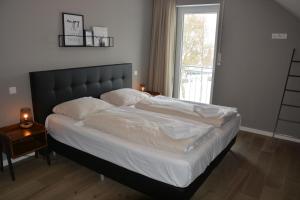 Vakantiehuiswinterberg客房内的一张或多张床位