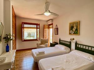 Precioso Chalet en Almuñecar junto al Mar con Garage privado客房内的一张或多张床位